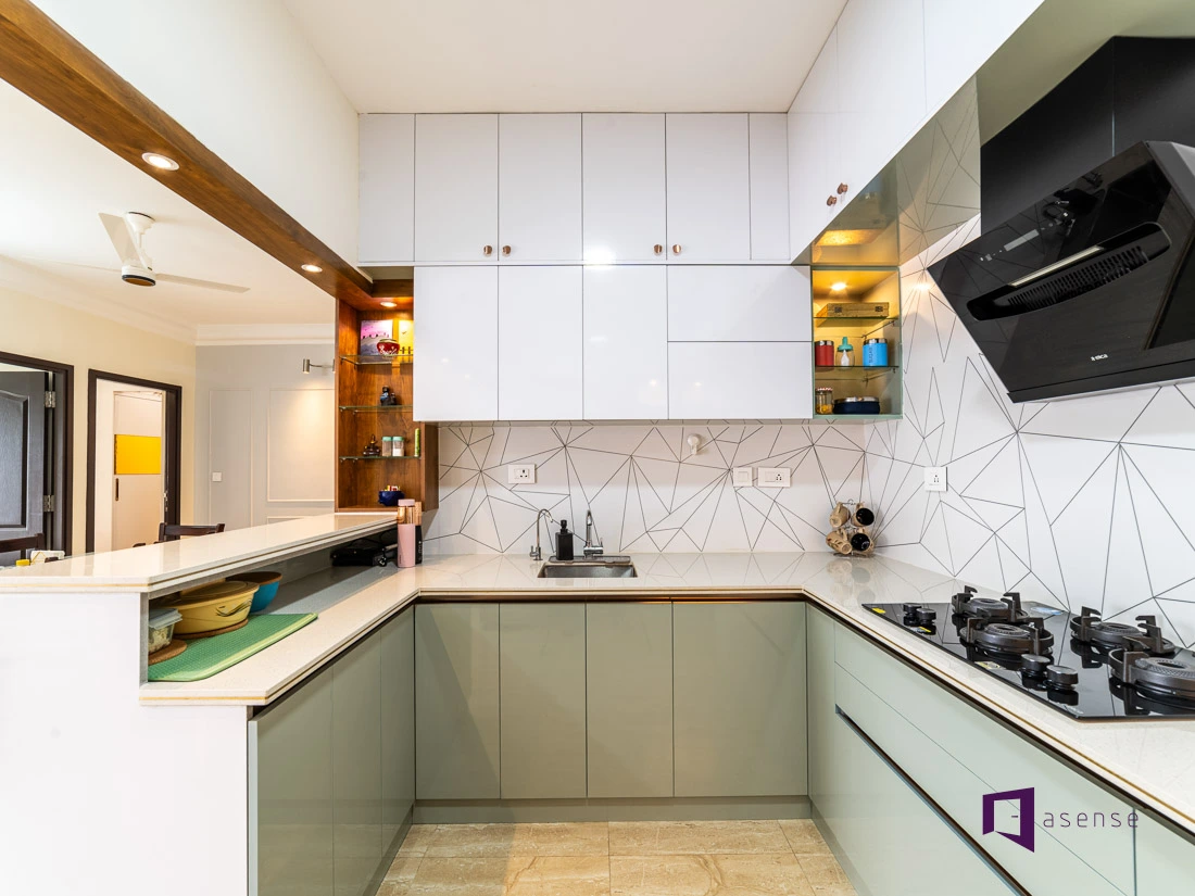 Modern kitchen detail showing clean cabinet lines and integrated appliance finish