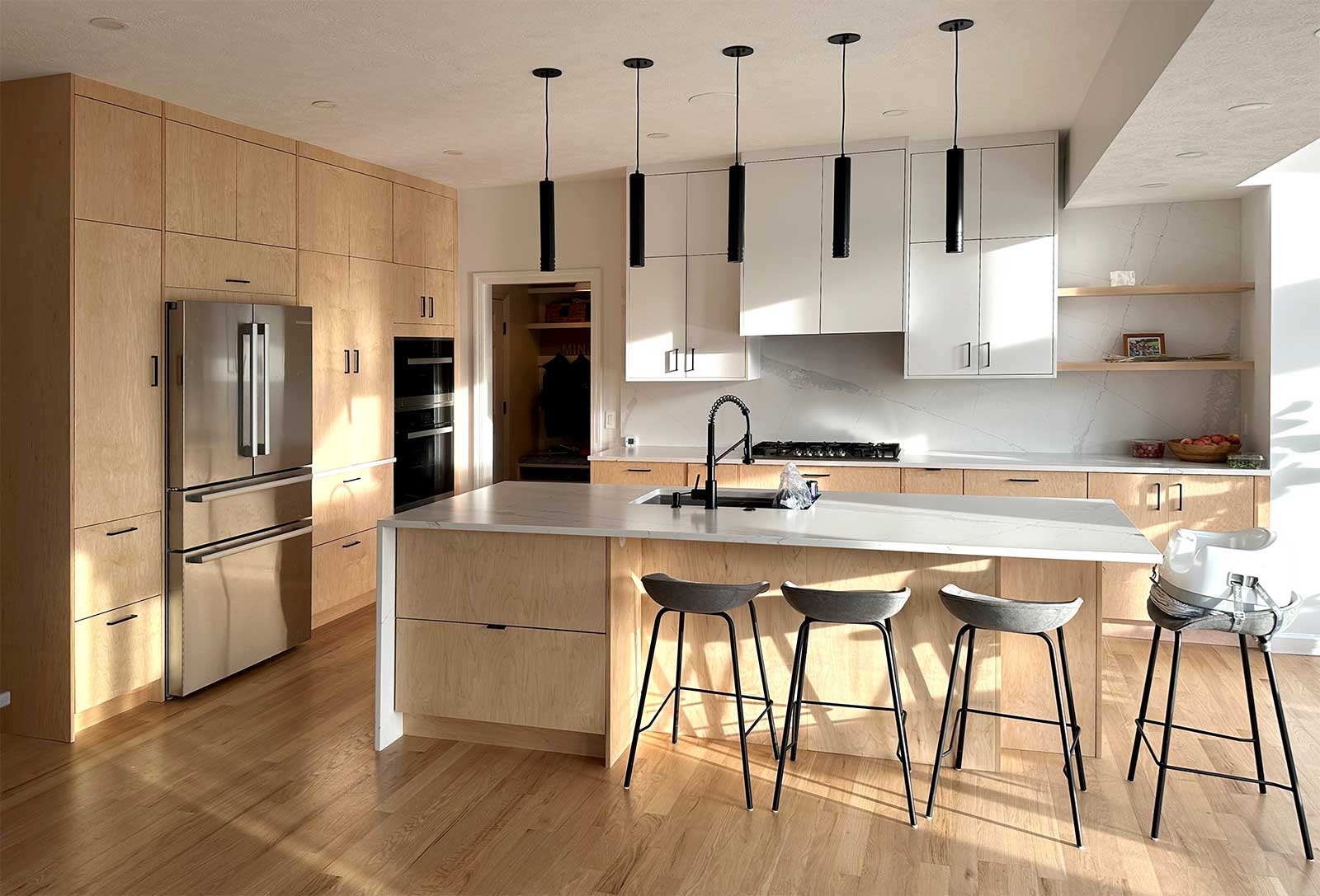 Modern kitchen storage interior showing handleless cabinets and integrated drawer systems