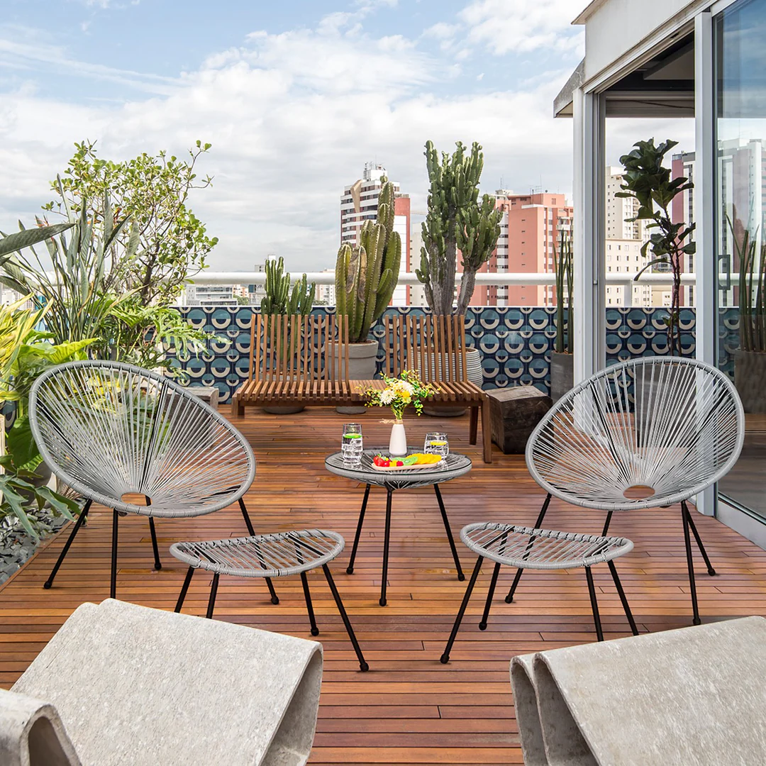 Balcony furniture detail showing premium wicker weave and aluminium frame construction