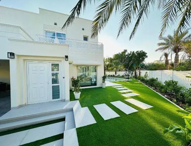 Lush green artificial lawn dubai close up