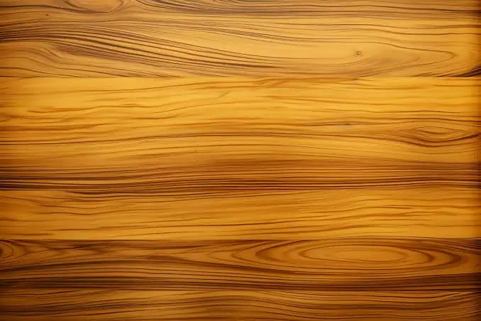 Golden teak plank flooring in a warm amber wood tone