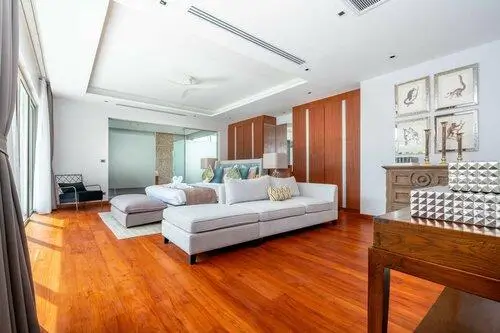 Hardwood flooring installed in a luxury master bedroom