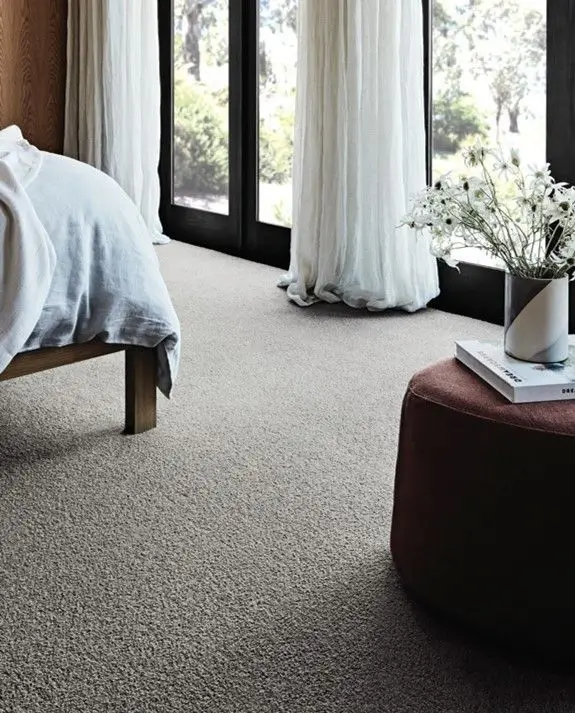 Wall to wall villa carpet in guest room with neutral tone